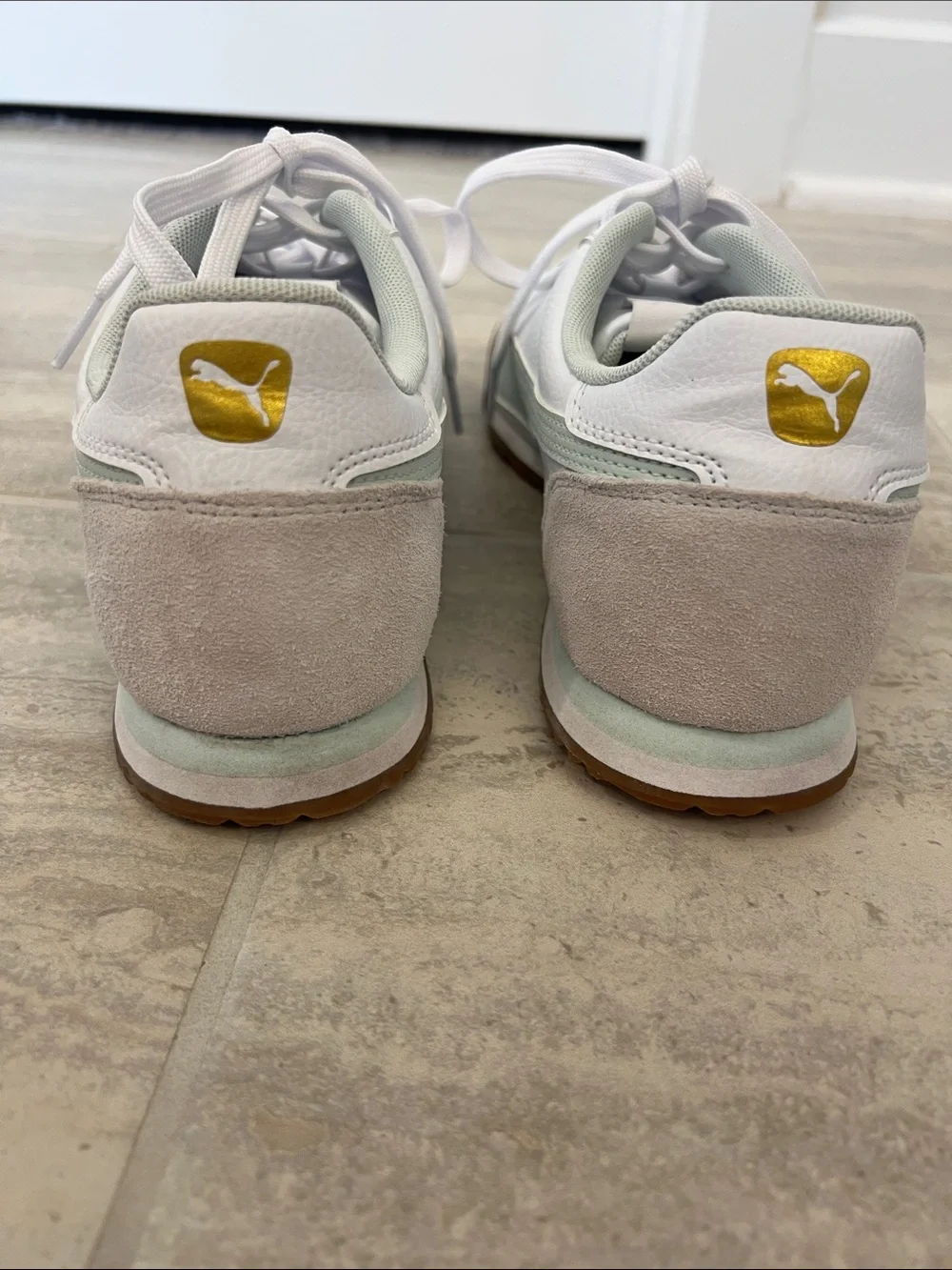 Puma Women’s White Sneakers with Light Green Accents